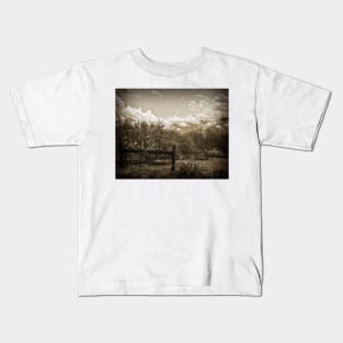 Old West Gate And Storm Clouds Kids T-Shirt